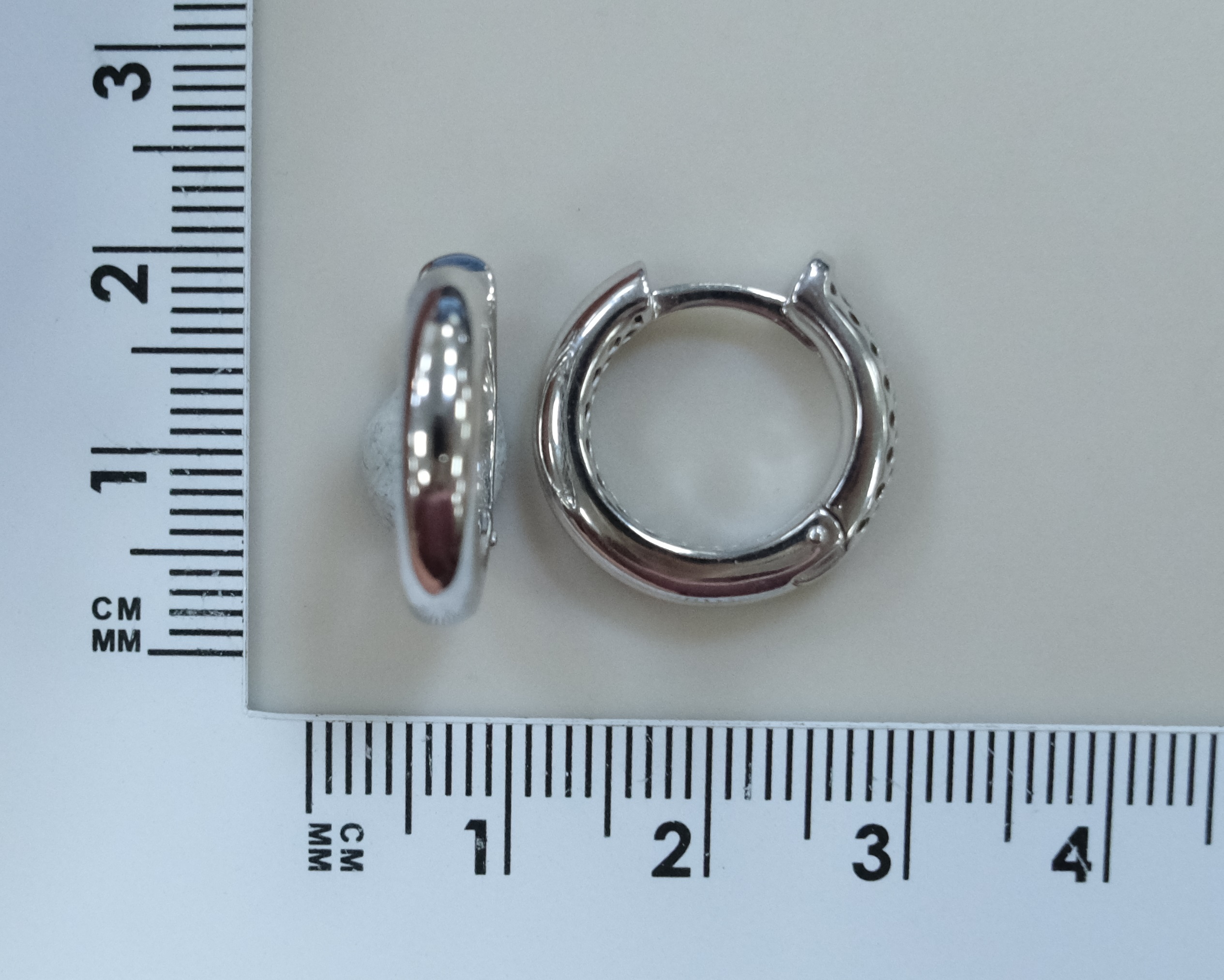 Серьги-конго из белого золота